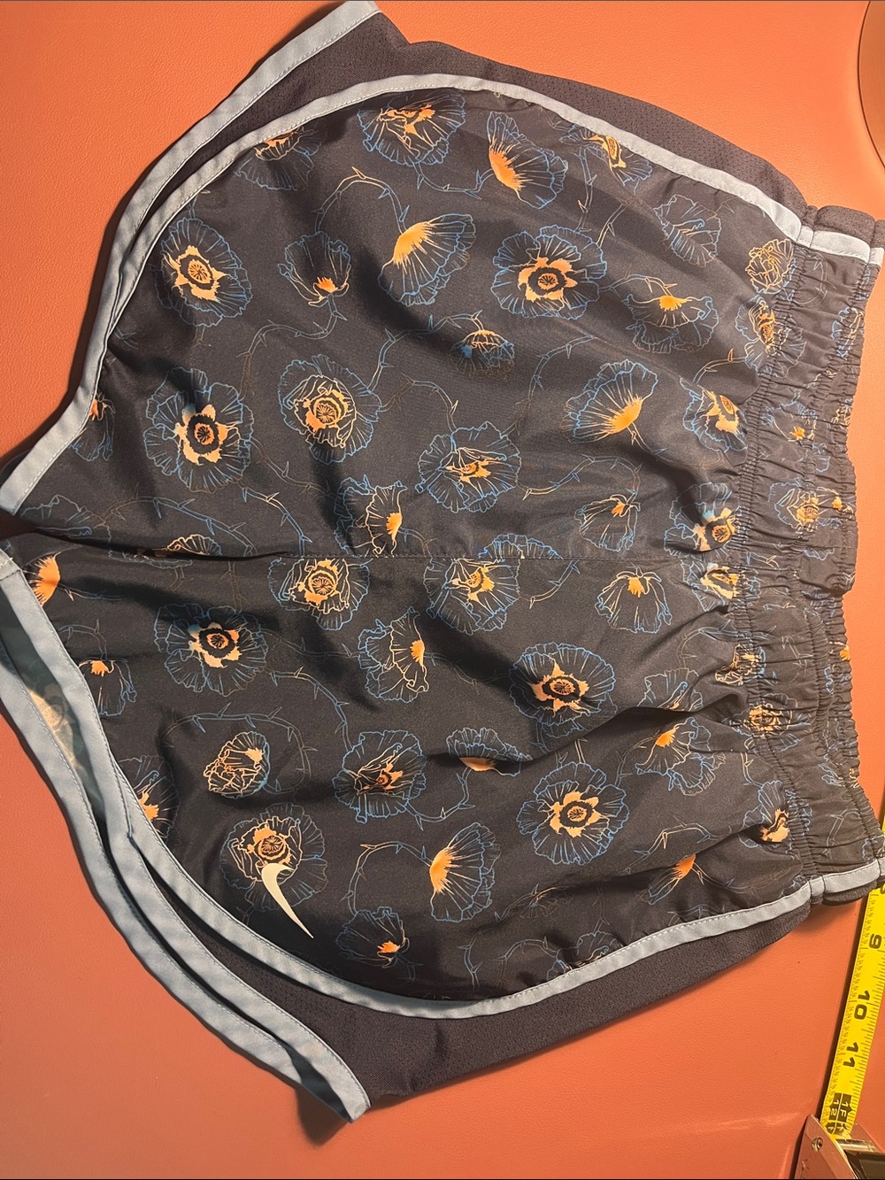 Nike Kids Floral Print Shorts in Navy with Orange and Light Blue Accents